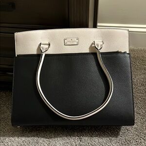 Sophisticated Black and White Tote with Metallic Accents